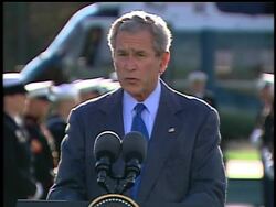 President Bush will host an international summit, perhaps as early as next month, to discuss ways to fix the world financial system.  At Camp David Saturday, he warned against reforms that threaten capitalism. News Clip