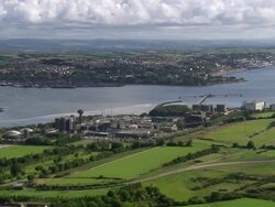 Aerial wide shot pan Cork and Cork Harbour / Ireland Stock Footage