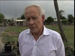 Australian relief teams flying in with aid, aerials of flood-hit province News Clip