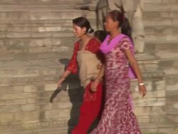 MS POV Two women one with  child  walking down from temple steps  / Kathmandu, Central, Nepal Stock Footage