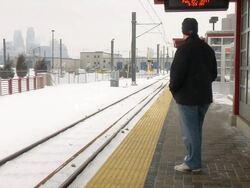 MS Man waiting at rail station in winter season / Saint Paul, Minnesota, United States  Stock Footage