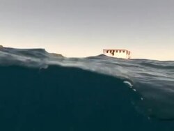 Camera bobbing at surface of water, Fernando de Noronha, Brazil Stock Footage