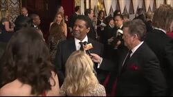 Denzel Washington speaking to reporters on the Oscars red carpet News Clip