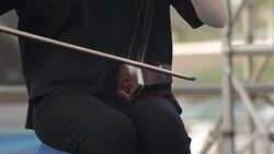 An actor playing a national musical instrument. Stock Footage