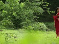 Woman in a forest, Malshej Ghat, Maharashtra, India Stock Footage