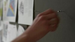 CU Businessman pinning project idea on board in office Stock Footage