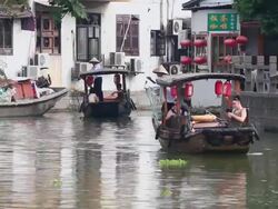 MS View of tour boats on river in village of Zhujiajiao / Shanghai,  China Stock Footage