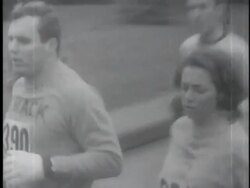 April 19, 1967 FILM MONTAGE MS PAN Men surrounding Katherine Switzer, first woman to run in the Boston Marathon/ MS Switzer running/ Boston, Massachusetts/ AUDIO Stock Footage