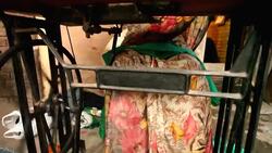 Traditional Asian Indian manual woman worker with sewing machine Stock Footage