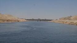 Travelling aboard boat down new Suez canal channel News Clip