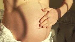 skin care abdomen during pregnancy Stock Footage