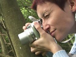 HD: Woman Photographing Stock Footage