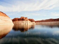 WS POV Rock formations showing visual signs of reduction of water levels in lake / ARIZONA,United States Stock Footage