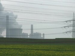 WS View of running coal power plants and electric pole with wire / Neurath, North Rhine Westphalia, Germany Stock Footage