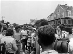 B/W 1961 John + Jacqueline Kennedy greeting crowd outdoors / Hyannis Port, Massachusetts Stock Footage
