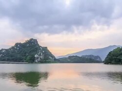 T/L WS PAN SevenStarCaveSunset / Zhaoqing, China Stock Footage