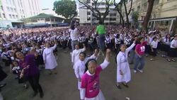 Students, school staff, nuns dance as part of campaign against violence to women News Clip