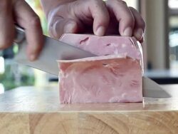 slicing ham Stock Footage