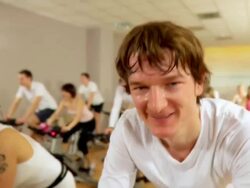 HD: Group Exercise On Spinning Bikes Stock Footage
