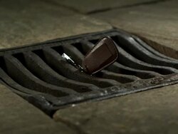 High Speed Keys falling through drain cover Stock Footage