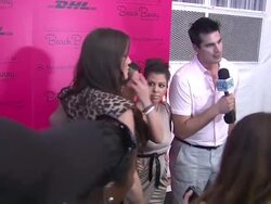 Khloe Kardashian, Kim Kardashian and Kourtney Kardashian at the Beach Bunny Swimwear 2011 show Stock Footage