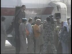 Freed tour group, including 11 Europeans, arrives at military airbase News Clip