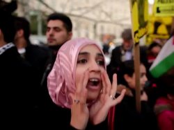 January 23, 2009 MS CU Young woman shouting Shame on Arab leaders! during protest against Israel's attack on Gaza Strip/ Washington DC/ AUDIO Stock Footage