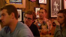 Debate viewers in Indiana react while watching on TV as Donald Trump and Hillary Clinton debate for the second time in St. Louis Stock Footage