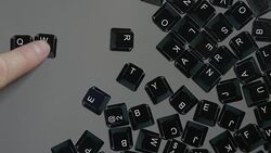 Keyboard fridge magnets spellimg QWERTY Stock Footage