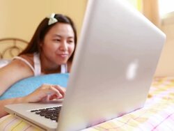 Woman using laptop Stock Footage