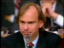 July, 1987 close up House counsel John Nields talks into microphone + listens during Iran-Contra hearings Stock Footage