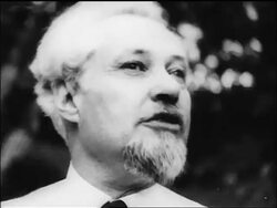 B/W 1910s close up Russian leader of peasants talking outdoors / documentary Stock Footage