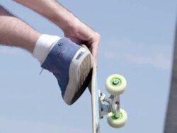 CU SLO MO TS Shot of guy doing aerial trick / Venice, California, United States Stock Footage