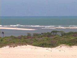 ZO, WS, Brazil, Ceara, Fortaleza,  Beach on sunny and windy day Stock Footage