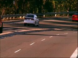 MS dual carriageway, cars move towards camera, Sydney, Australia Stock Footage