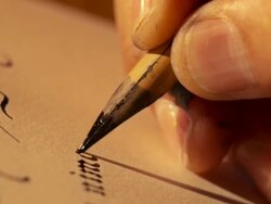 HD: Monk's Hand At Writing Calligraphy Stock Footage