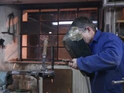 HD: Worker Welding In Workshop Stock Footage