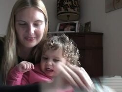 Mother daughter looking some photos Stock Footage