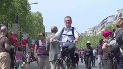 CLEAN : Strolling and selfless as Paris Champs Elysees goes car free News Clip