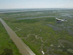 AERIAL WS Seaplane flying over delta gulf / New Orleans, Louisiana, United States Stock Footage