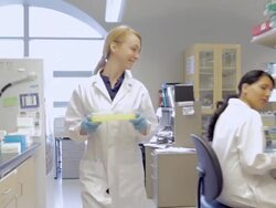 MS POV Female Lab technician walking with samples at Cancer research Healthcare medicine Industry DNA sequencing Laboratory / Vancouver, BC, Canada    Stock Footage