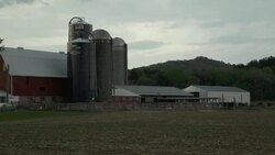 Wisconsin dairy farm and grain silos Stock Footage
