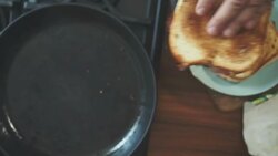 Preaparing and Roasting Bacon Sandwich Stock Footage