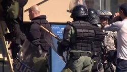 Baltomore riot police get into armoured truck News Clip