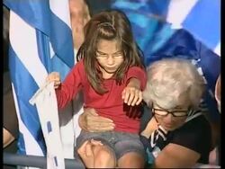 Greek PM gives victory wave to crowds after partial official result News Clip