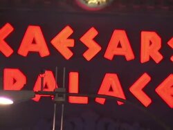 Las Vegas Caesars' Palace casino sign at night News Clip