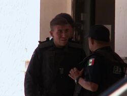 April 9 2009 MS TS PAN Police officers outside police station, Juarez, Chihuahua, Mexico, AUDIO Stock Footage