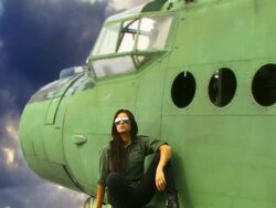 Young Woman and old Plane Stock Footage