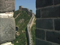 Zoom out then in to Great Wall of China, from battlement, Badaling, China Stock Footage
