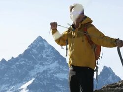 Portrait of climber pulling rope tight to teammates Stock Footage